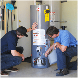 Common Water Heaters Problems Fremont two techs looking at a water heater